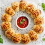Pizza balls with sauce garnish 202605062114