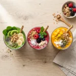 Three smoothie glasses on table 202605022240